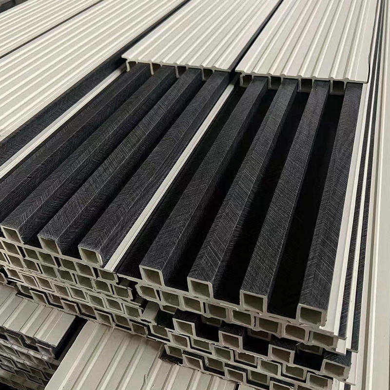 Intérieur imperméable à l'eau Panneau mural en polyvinyle chlorure de grain de bois Décoration écologique