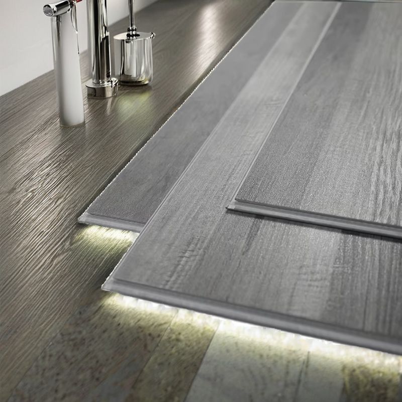 Plancher en vinyle SPC de style moderne Bon design Plastic 4,5 mm 5,5 mm 6,5 mm Utilisation intérieure PVC antidérapant à texture claire