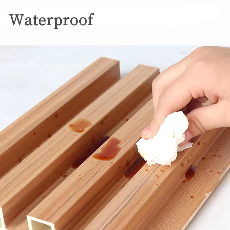 Panneau mural PVC WPC à rainures imitation bois Panneau 3D pour la décoration